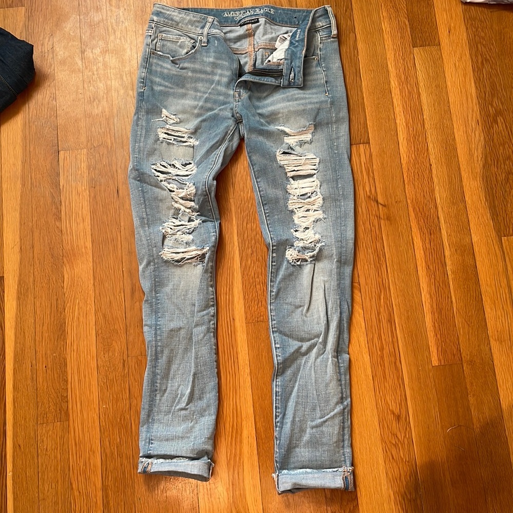 light blue ripped jeans